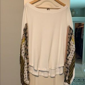 Free People thermal top with embellished sleeves.